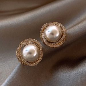 Gold plated and diamond pearl earrings.